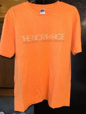 The North Face Men's Short Sleeve Tee in Orange with White Logo